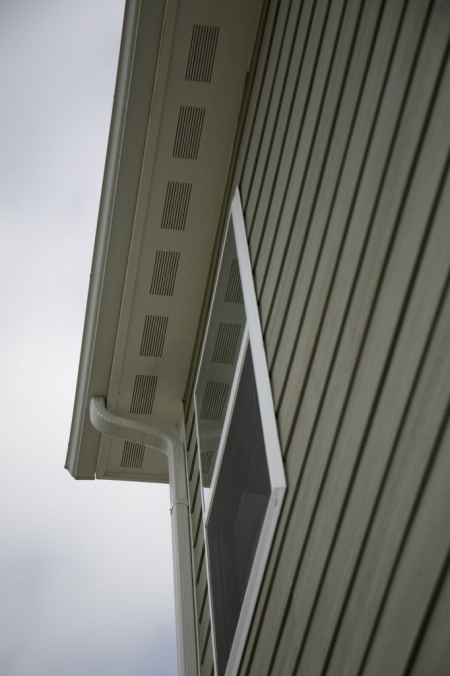 Siding, soffet and gutters on a home.